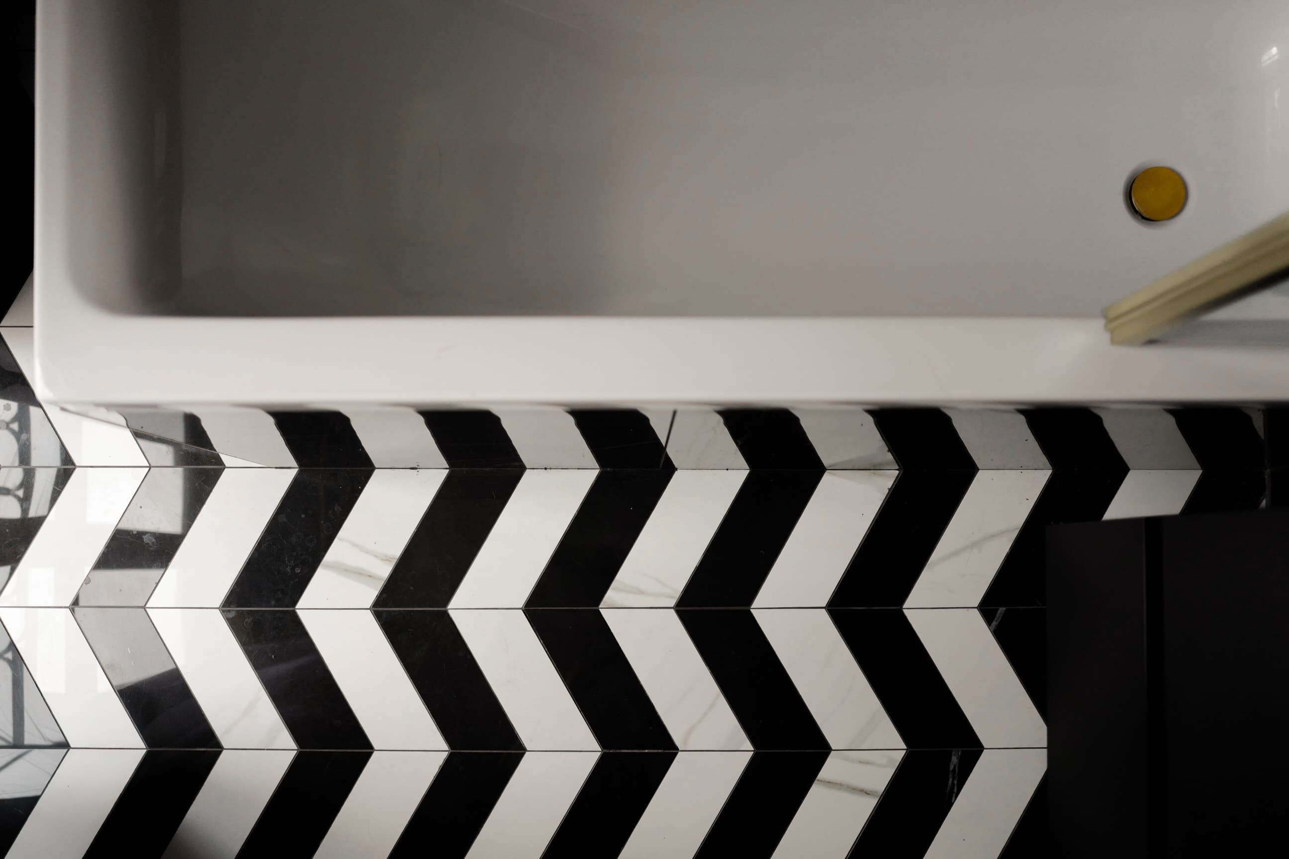 Milan Jewel floor detail — encaustic tile pattern, the kind of surface that rewards looking down